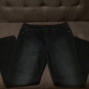 Kim Rogers pull on blue jeans